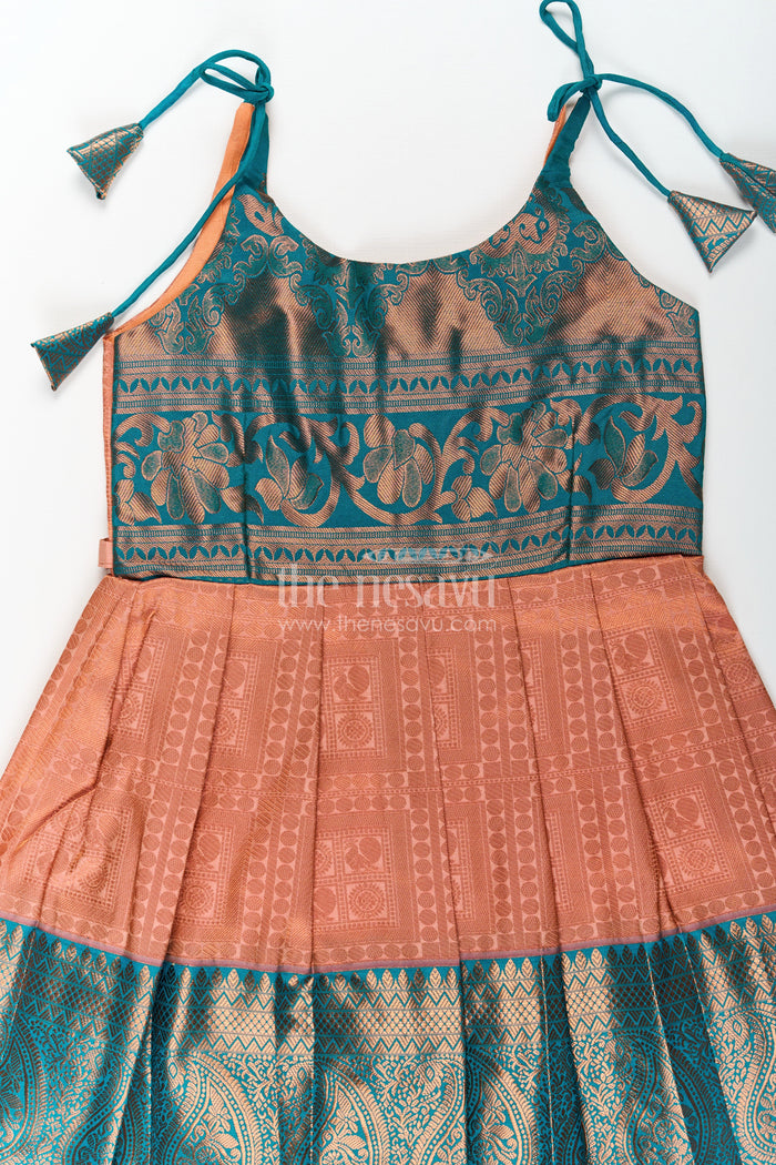 The Nesavu Tie Up Frock Girls Ethnic Silk Dresses in Semi Kanchivaram with Tie Up Sleeves and Zari Woven Orange Green Pleated Skirt Nesavu Nesavu Ethnic Silk Dresses for Girls in Semi Kanchivaram with Orange Green Zari Pleated Tie Up Frock