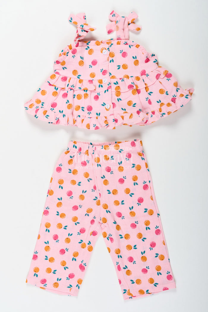 The Nesavu Girls Casual Set Girls Muslin Pink Ethnic Wear Set with Ruffle Top and Printed Pants for Comfortable Everyday Style Nesavu Nesavu Girls Muslin Printed Pink Ethnic Wear Set with Ruffle Top and Matching Pants for Daily Comfort