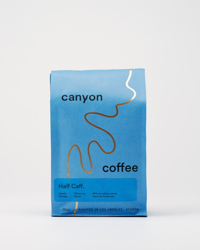 Half Caff.