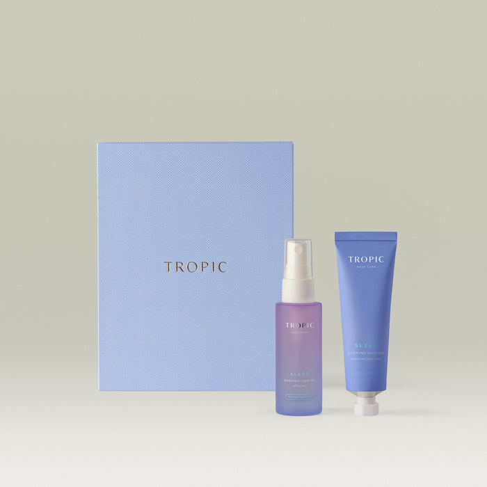 Tropic The Dream Team Collection with Sleep Evening Unwind pillow mist and hand balm in a purple gift box.