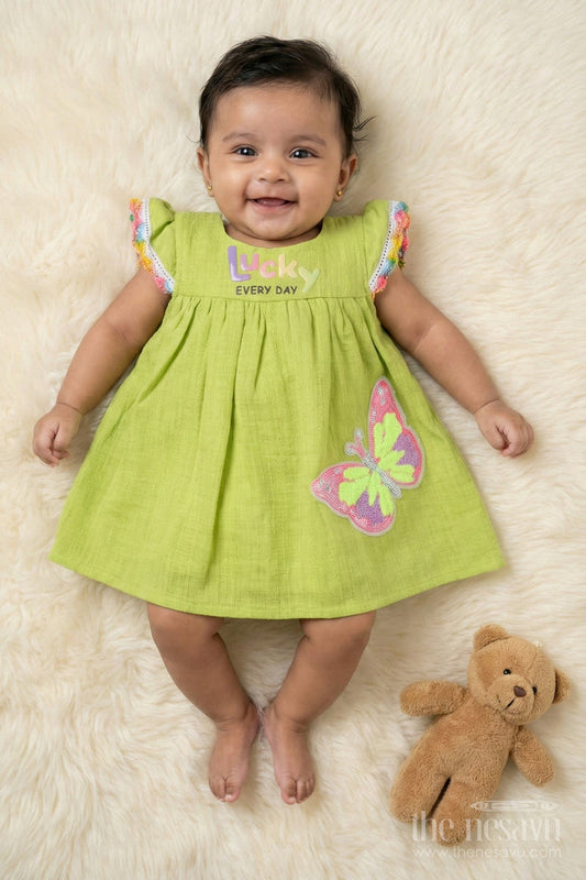 The Nesavu Baby Cotton Frocks Toddler Girl Cotton Frock with Sequin Butterfly Patch for Playful Days Nesavu 14 (6M) / Green BFJ892B-14 Nesavu toddler girl cotton frock with sequin butterfly patch and rainbow trim for everyday fun